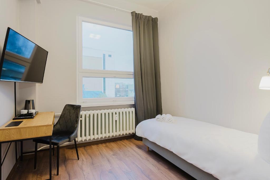 Postel nebo postele na pokoji v ubytování Hala Hostel - Pokoje na wyłączność tuż przy Dworcu Gdynia