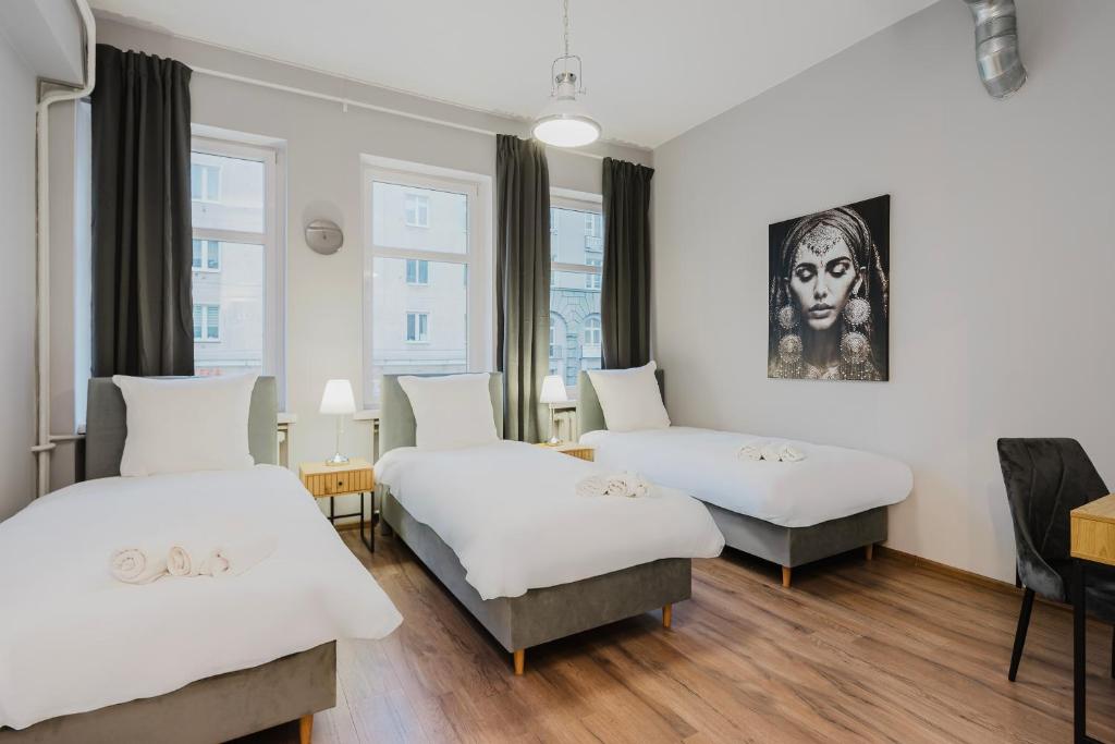 Postel nebo postele na pokoji v ubytování Hala Hostel - Pokoje na wyłączność tuż przy Dworcu Gdynia