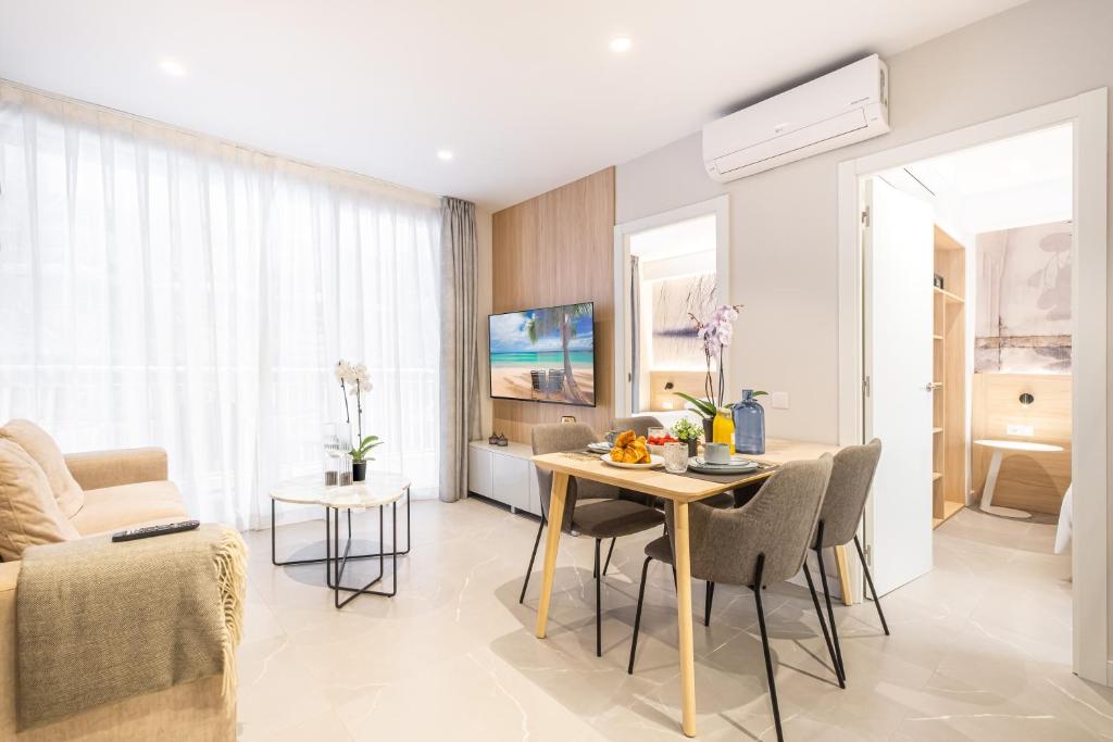 TV a/nebo společenská místnost v ubytování Mara Boutique Apartments