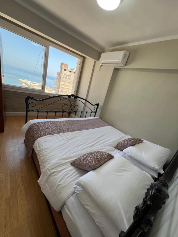 Postel nebo postele na pokoji v ubytování Sea View Haven In San Stefano