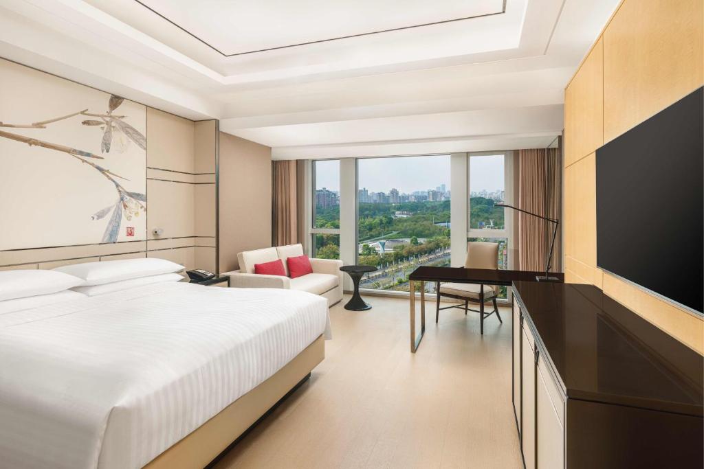 Postel nebo postele na pokoji v ubytování Shanghai Marriott Hotel Parkview