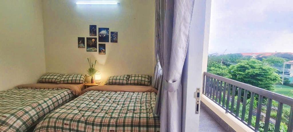 Postel nebo postele na pokoji v ubytování Ola's Home