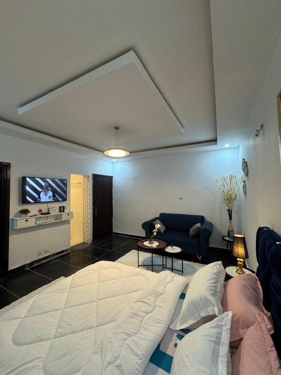 מיטה או מיטות בחדר ב-Residence Imela
