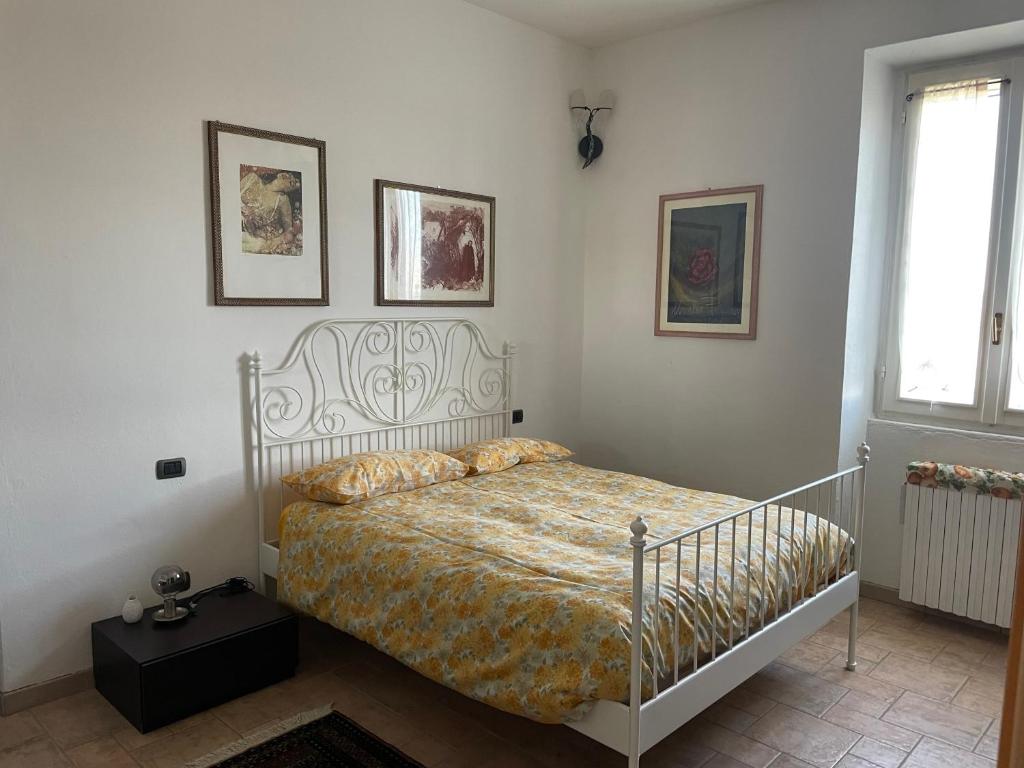 Postel nebo postele na pokoji v ubytování BeB cascina Mentirone