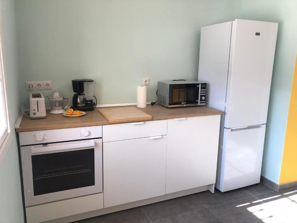 Kuchyň nebo kuchyňský kout v ubytování Hostel La Fanega