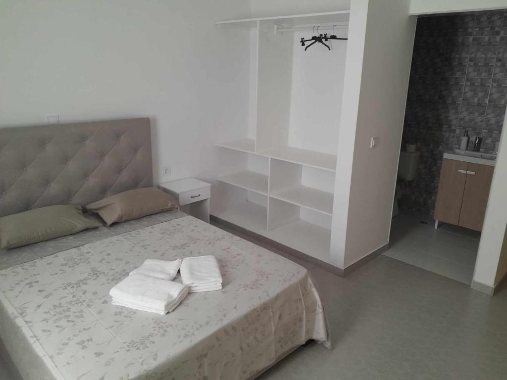 Postel nebo postele na pokoji v ubytování Hostel Rocha Marisol