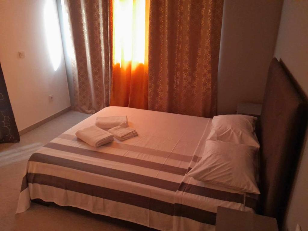 Postel nebo postele na pokoji v ubytování Hostel Rocha Marisol