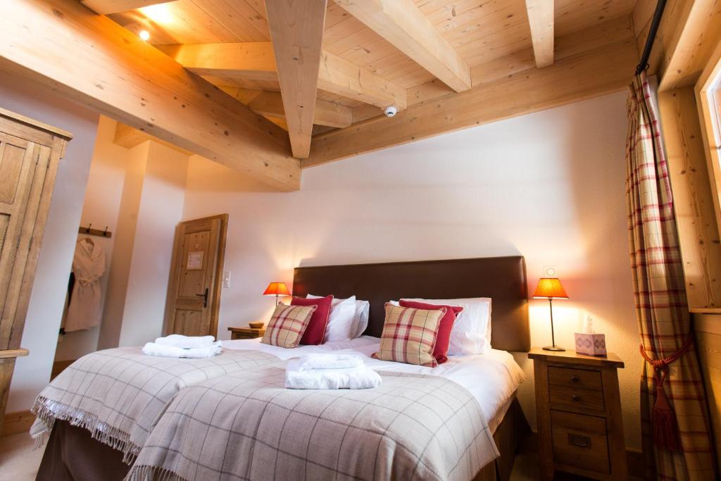 Postel nebo postele na pokoji v ubytování Mountain Lodge, Les Crosets