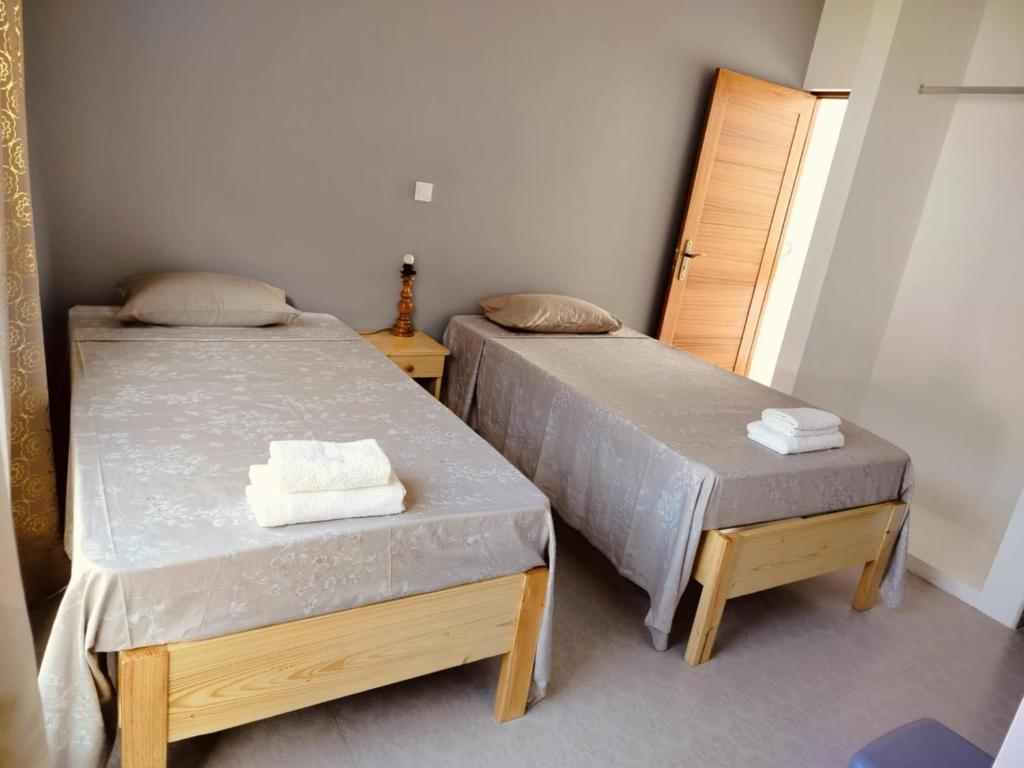 Postel nebo postele na pokoji v ubytování Hostel Rocha Marisol
