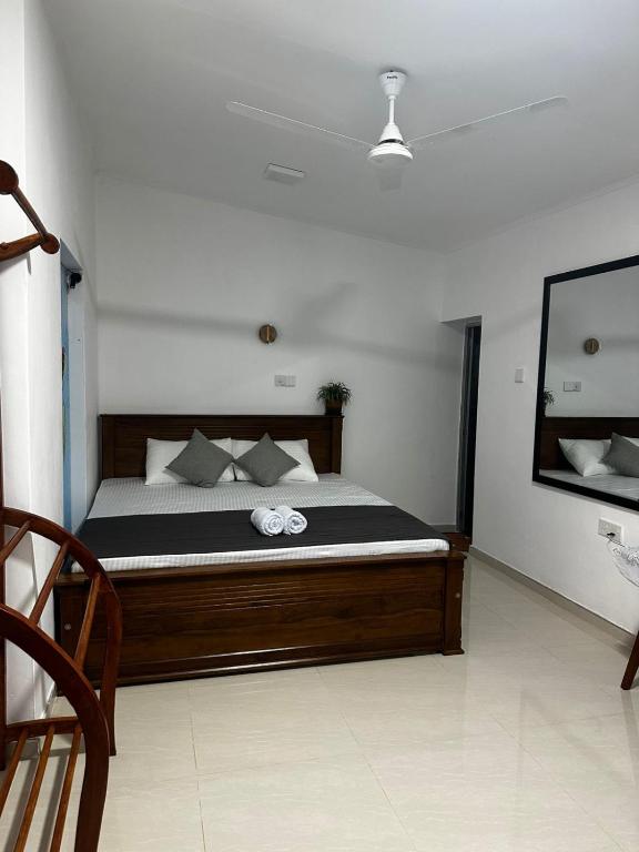 A bed or beds in a room at TaMaRiNd house