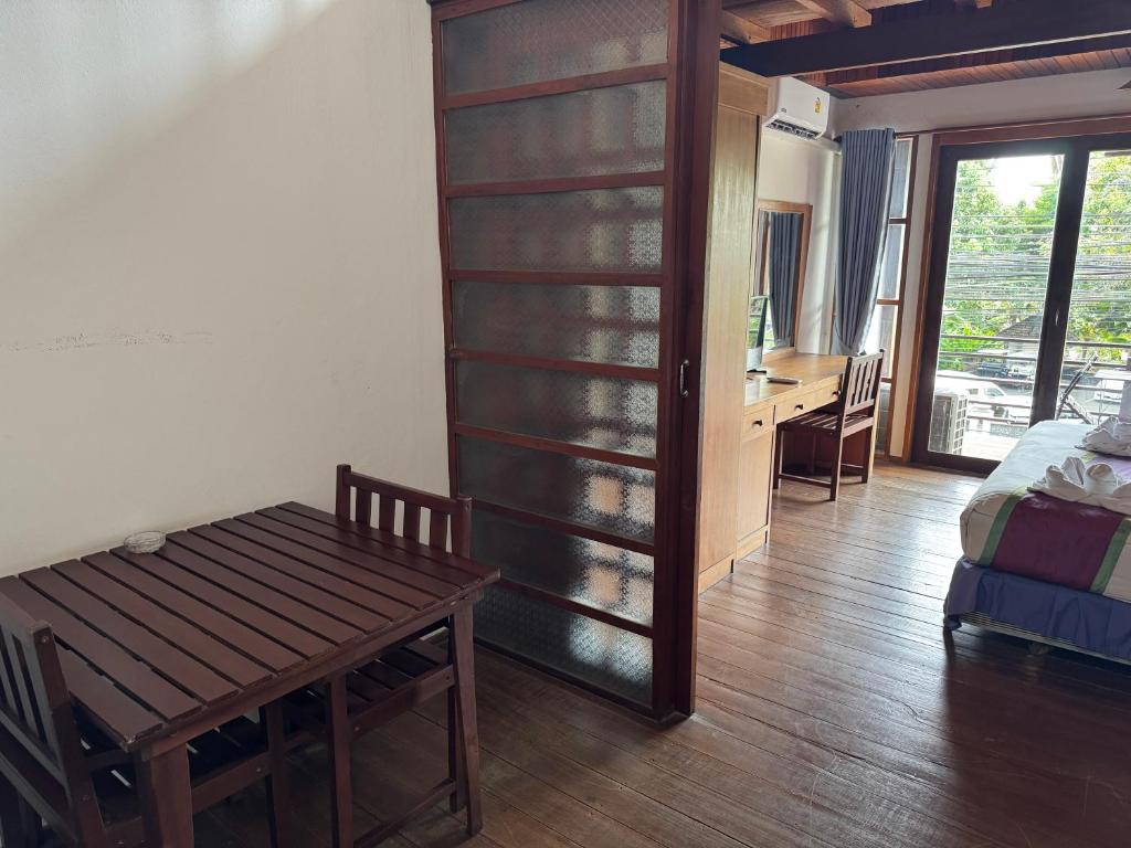 Postel nebo postele na pokoji v ubytování Sasitara Residence