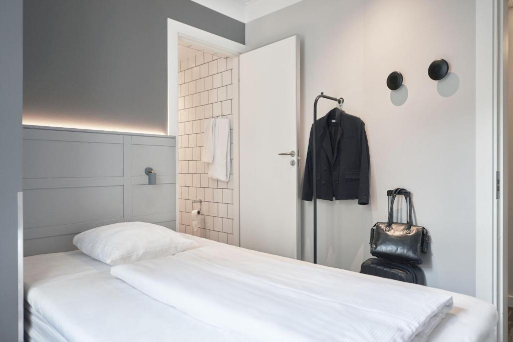 Postel nebo postele na pokoji v ubytování Four Points Flex by Sheraton Copenhagen City