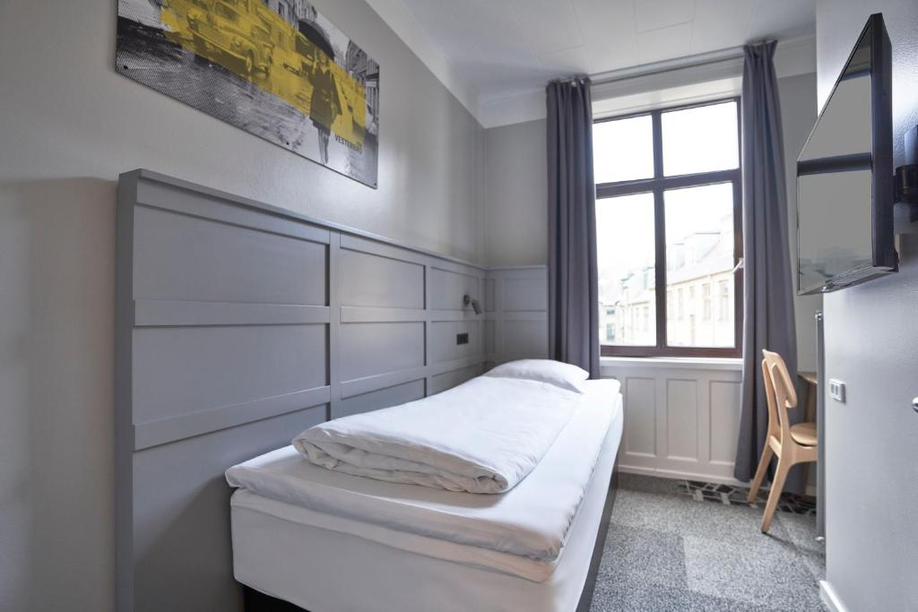 Postel nebo postele na pokoji v ubytování Four Points Flex by Sheraton Copenhagen City