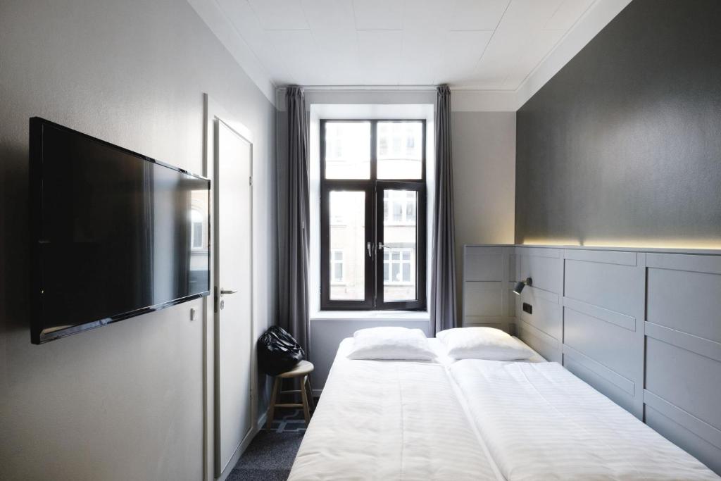 Postel nebo postele na pokoji v ubytování Four Points Flex by Sheraton Copenhagen City