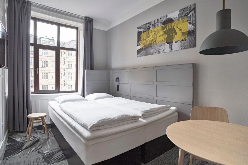 Postel nebo postele na pokoji v ubytování Four Points Flex by Sheraton Copenhagen City
