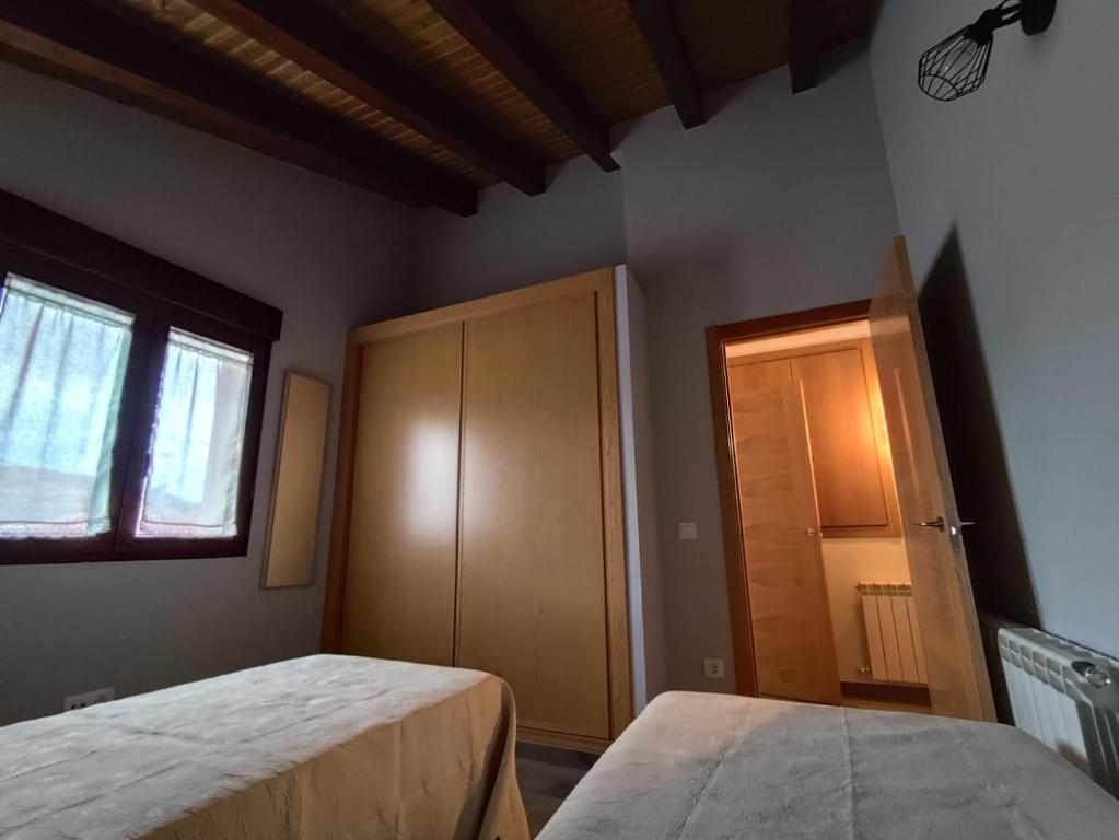 Postel nebo postele na pokoji v ubytování El Trillo