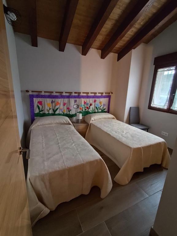 Postel nebo postele na pokoji v ubytování El Trillo