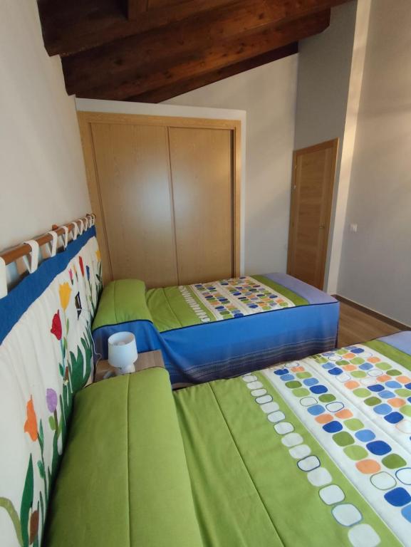 Postel nebo postele na pokoji v ubytování El Trillo
