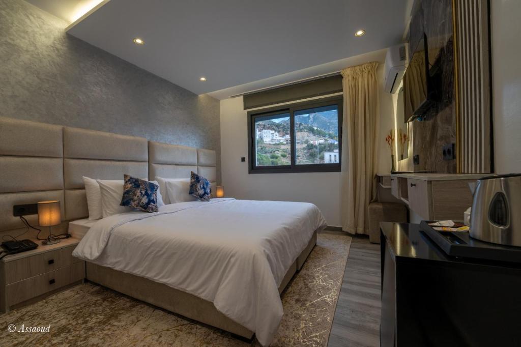 Postel nebo postele na pokoji v ubytování Luxury Chaouen
