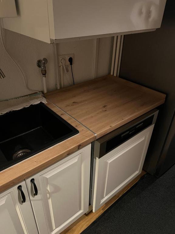 Kuchyň nebo kuchyňský kout v ubytování KemptenCityHostPlus-Unterkunft Charme im Denkmal