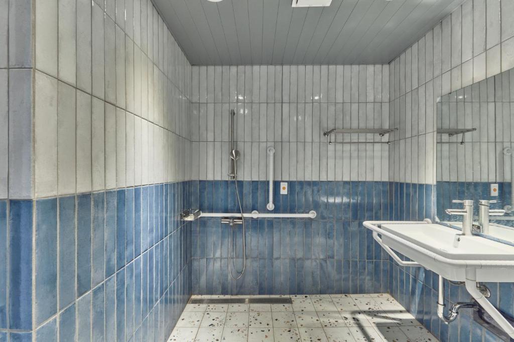 Koupelna v ubytování Sanhe Hotel