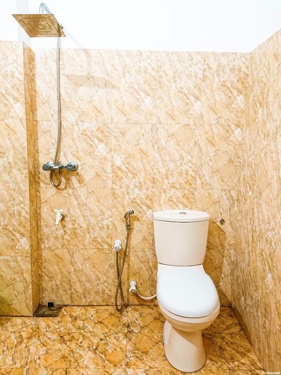 Koupelna v ubytování Kapila Gusethouse in Unawatuna