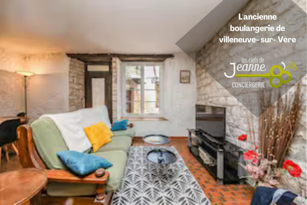 Ruang duduk di L'ancienne boulangerie de Villeneuve- sur- Vère