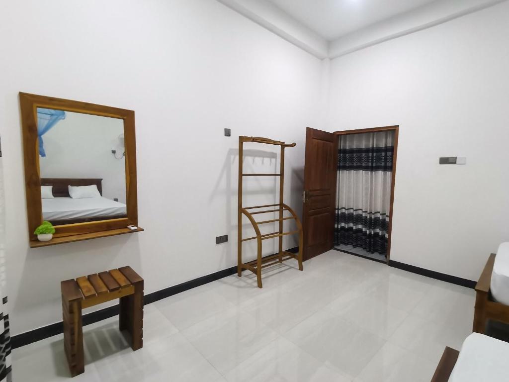 Postel nebo postele na pokoji v ubytování Ancient Breeze HomeStay