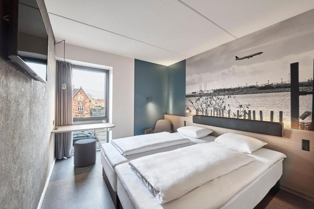 Four Points Flex by Sheraton Copenhagen Airport - Resim 6