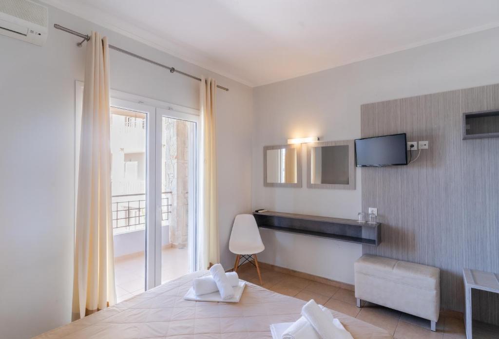 Letto o letti in una camera di Siviris Golden Beach