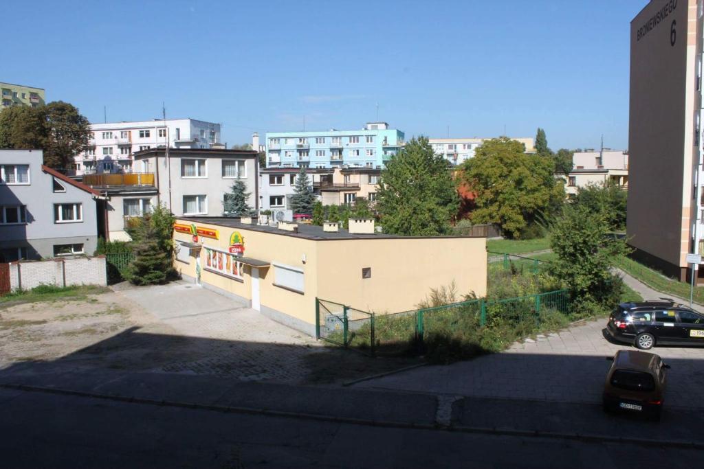 a view of a parking lot in a city at Broniewskiego in Gdańsk