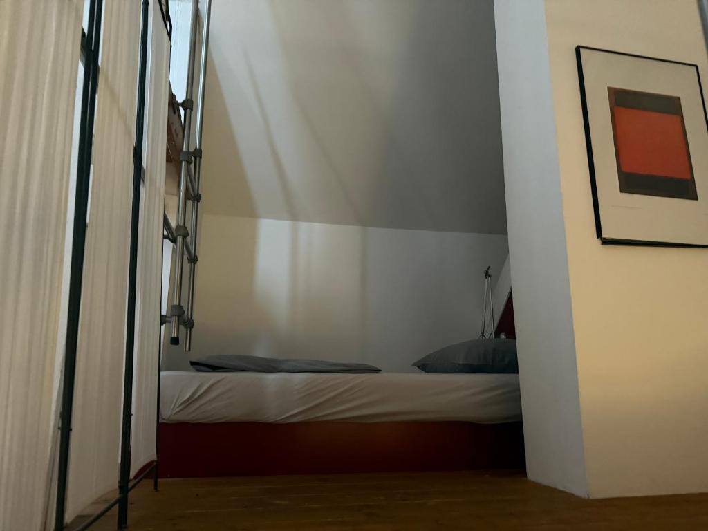 Postel nebo postele na pokoji v ubytování WHLIVING - Apartments & Studios in Konstanz