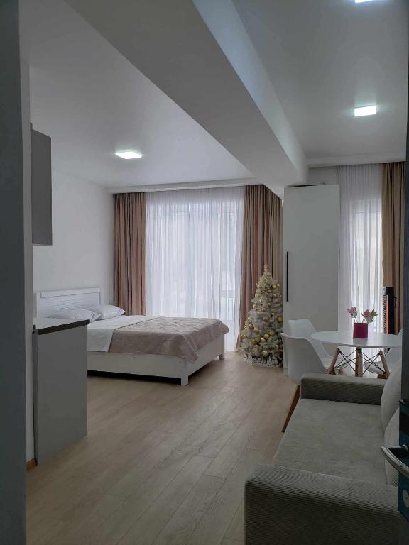 Postel nebo postele na pokoji v ubytování Bakuriani 4rest , X2 Development