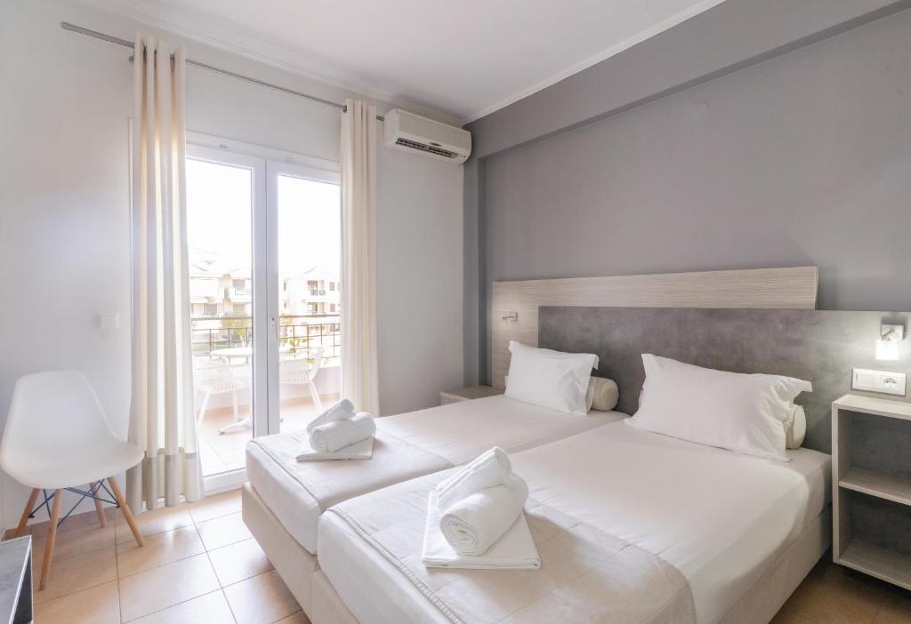 Letto o letti in una camera di Siviris Golden Beach