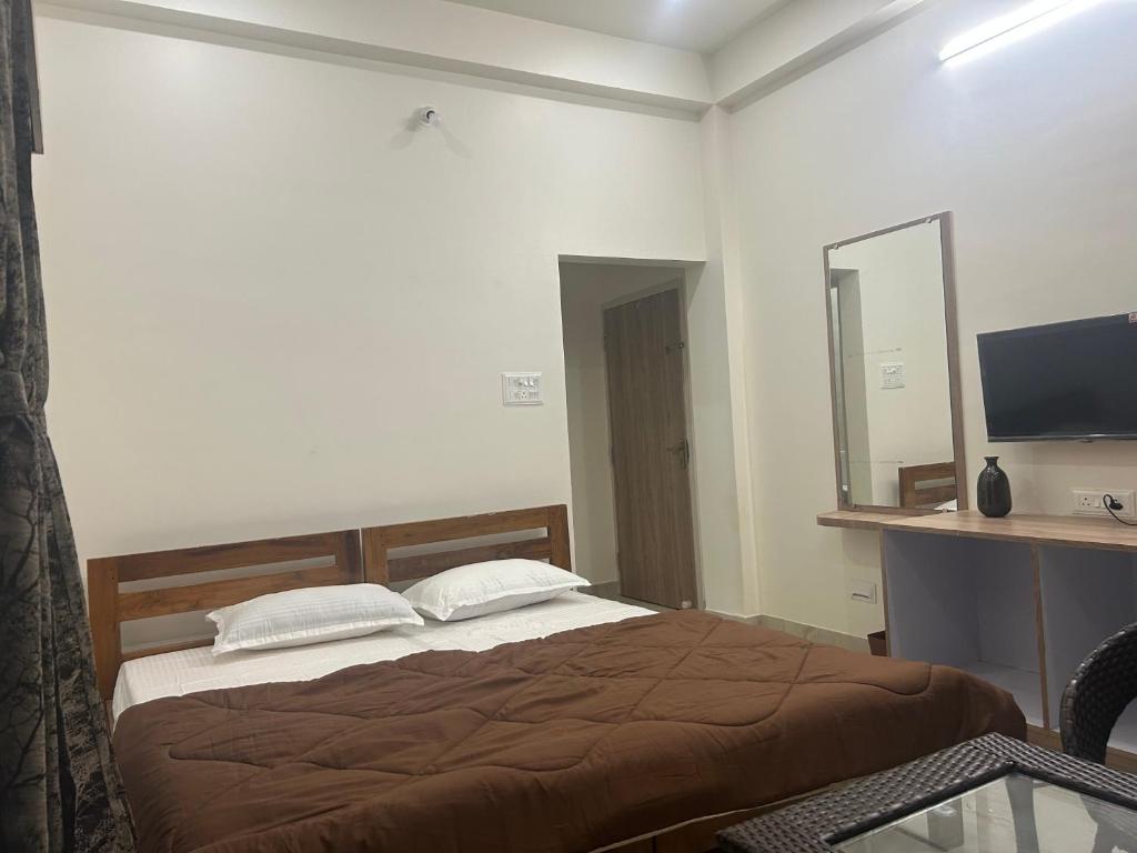 Postel nebo postele na pokoji v ubytování Alivia Eco-Stay