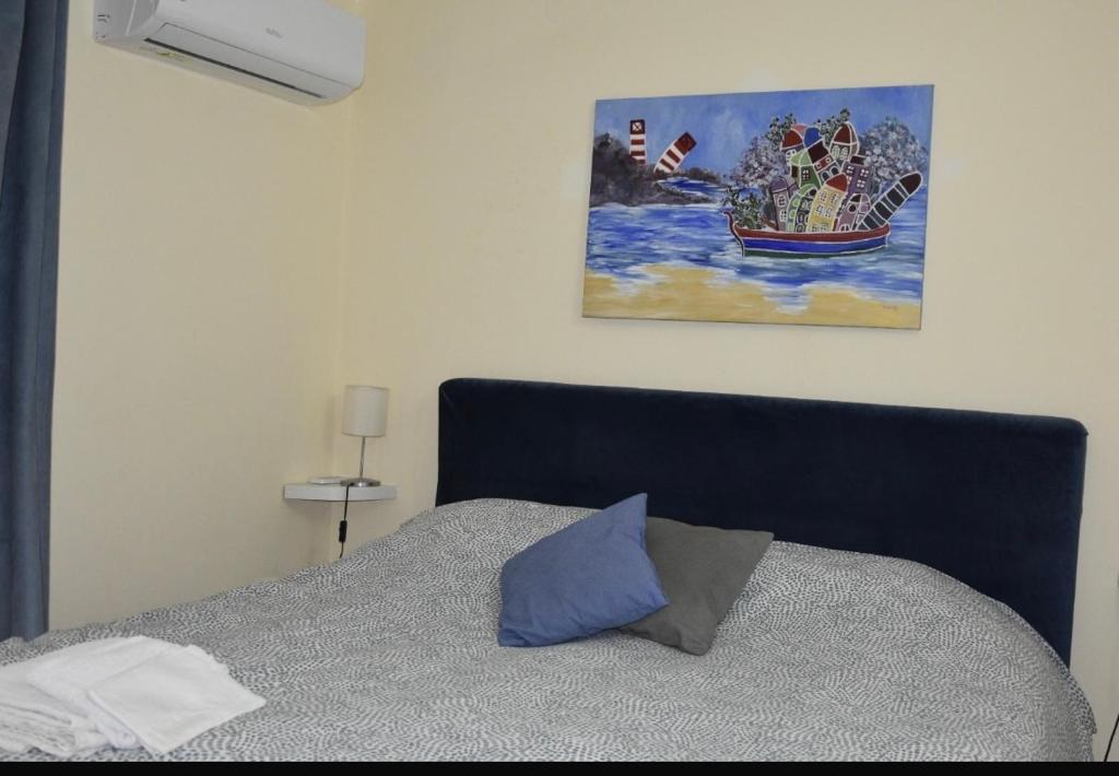 Łóżko lub łóżka w pokoju w obiekcie Glemmyhouse