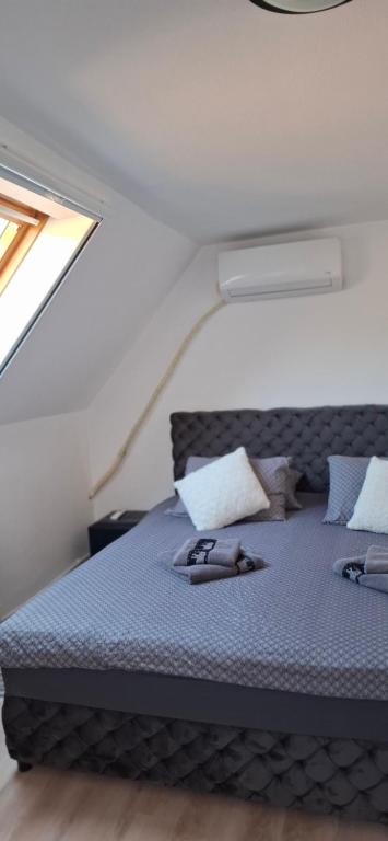 Postel nebo postele na pokoji v ubytování Vila Jovana