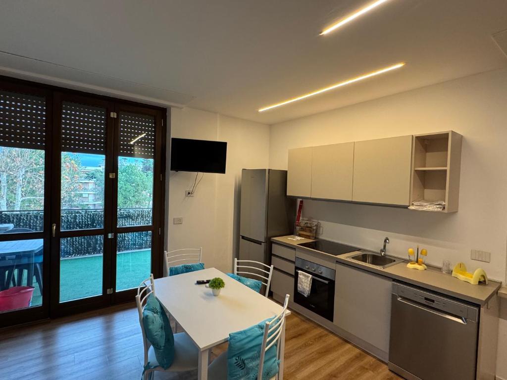 A kitchen or kitchenette at La Vecchia Stazione B&B