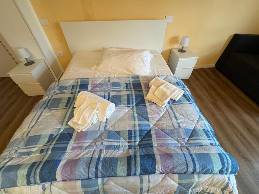 A bed or beds in a room at La Vecchia Stazione B&B