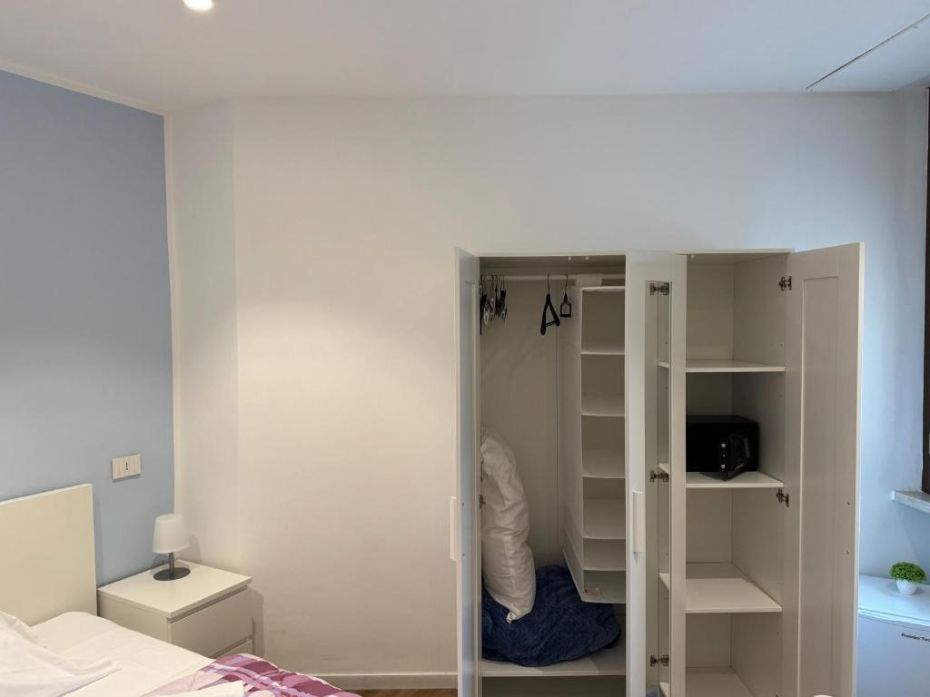 A bed or beds in a room at La Vecchia Stazione B&B