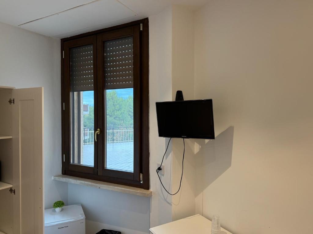 A television and/or entertainment centre at La Vecchia Stazione B&B
