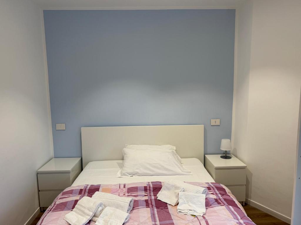A bed or beds in a room at La Vecchia Stazione B&B