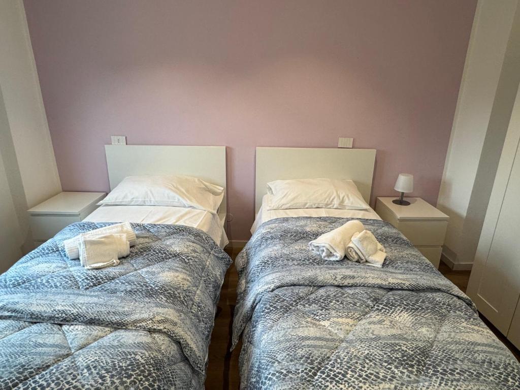 A bed or beds in a room at La Vecchia Stazione B&B