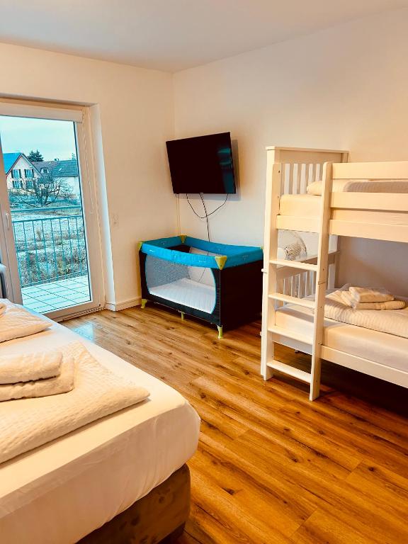 Postel nebo postele na pokoji v ubytování Apartments La Rosa