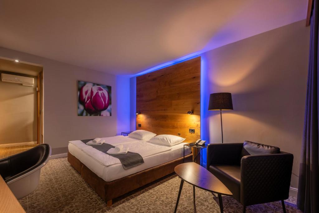 Postelja oz. postelje v sobi nastanitve Ljubljana Resort Hotel & Camping