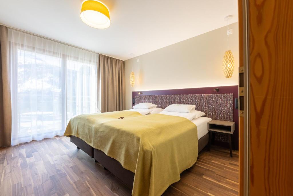 Postel nebo postele na pokoji v ubytování Hotel Allegra 3 Stern Superior