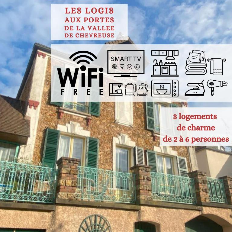 un panneau sur le côté d'un bâtiment dans l'établissement Les Logis Aux portes de la Vallée de Chevreuse, à Gometz-le-Châtel