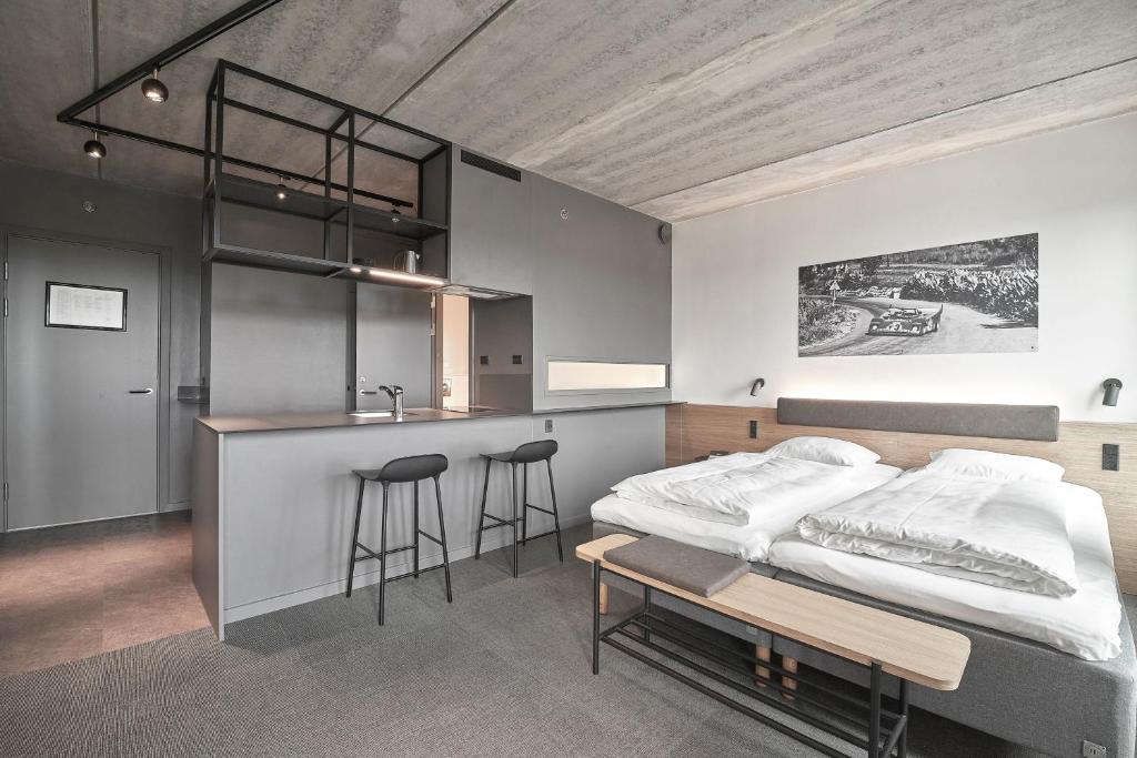 Postel nebo postele na pokoji v ubytování Four Points Flex by Sheraton Lyngby