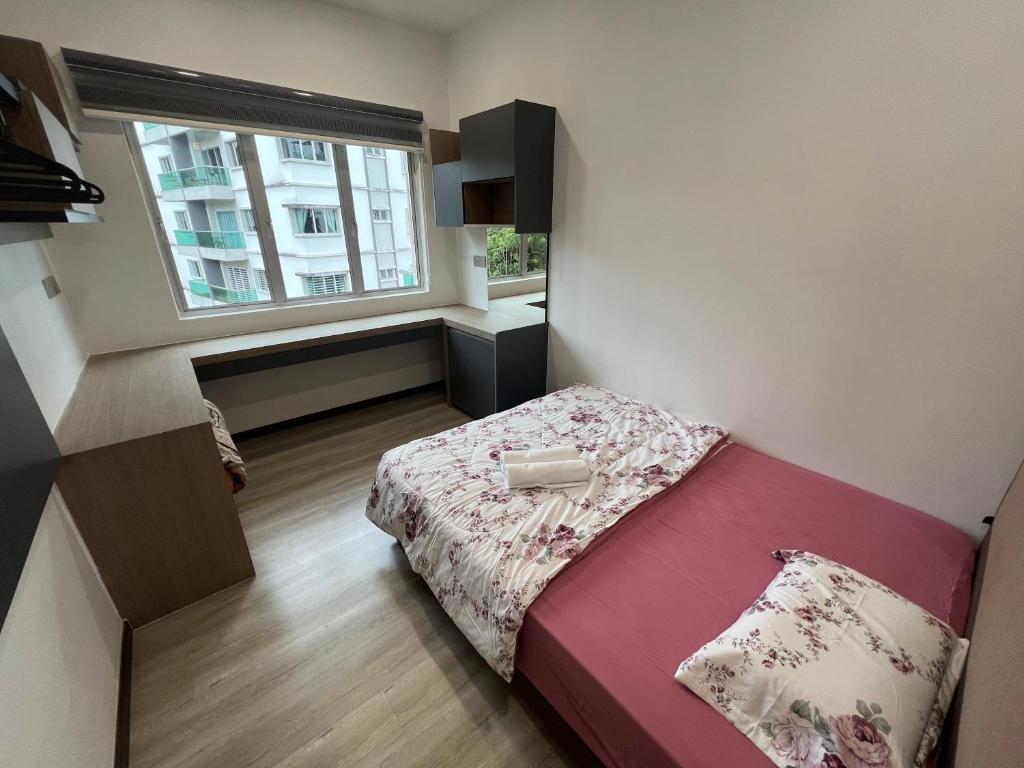 Postel nebo postele na pokoji v ubytování DanteQuintet Cameron Highlands