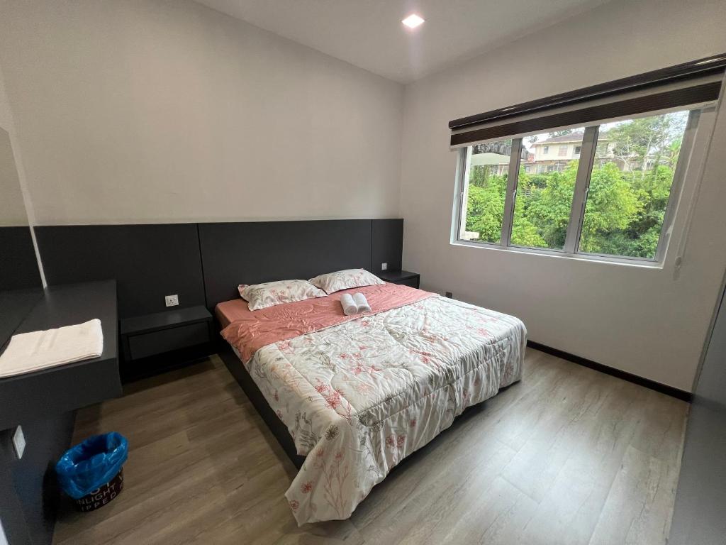 Postel nebo postele na pokoji v ubytování DanteQuintet Cameron Highlands